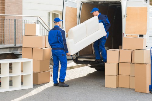 Packed boxes and furniture prepared for a local move