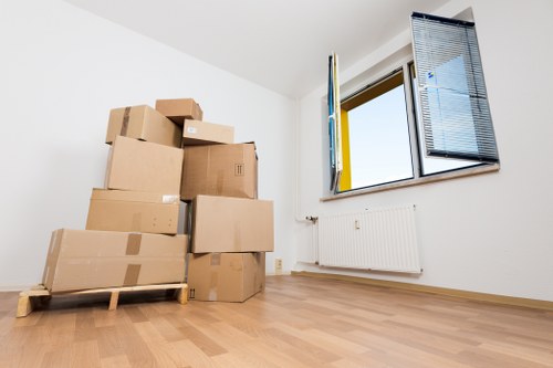 Careful loading of household furniture into a removals van in Kentish Town
