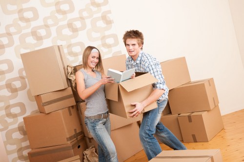 Loading boxes and furniture into a van near Kentish Town