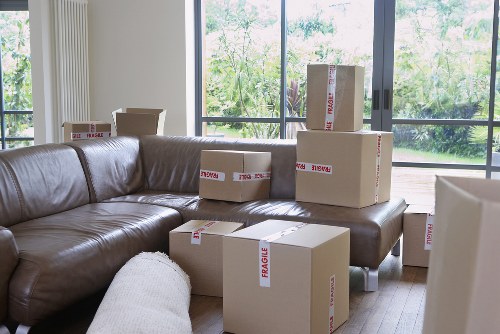 Movers loading items securely with safety awareness